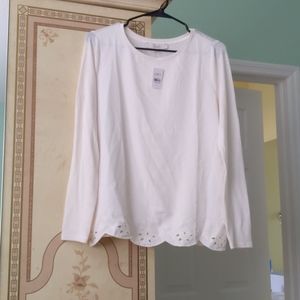 Off white blouse with detail on the bottom